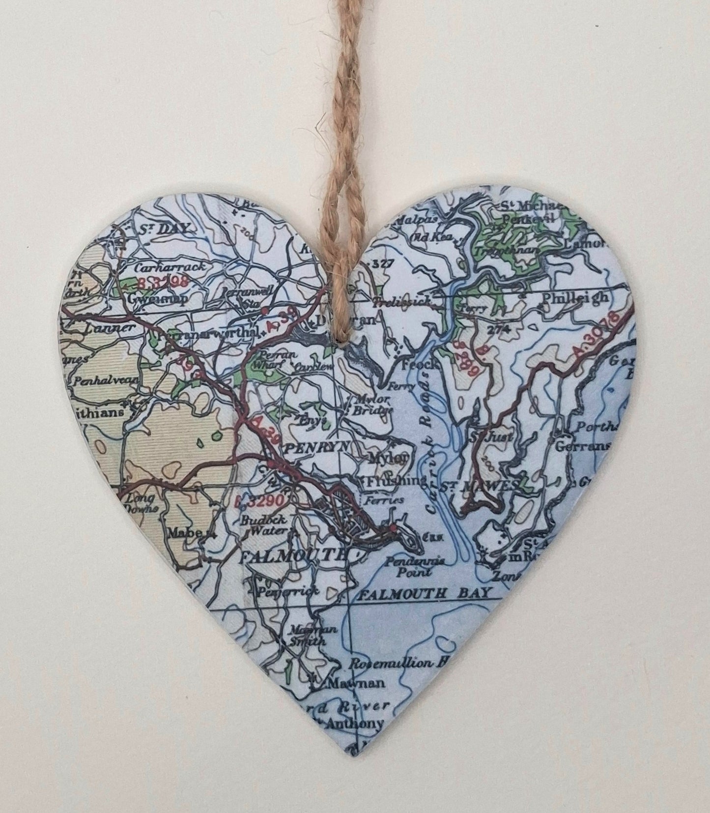 Vintage map heart in pastel colours with a natural jute string