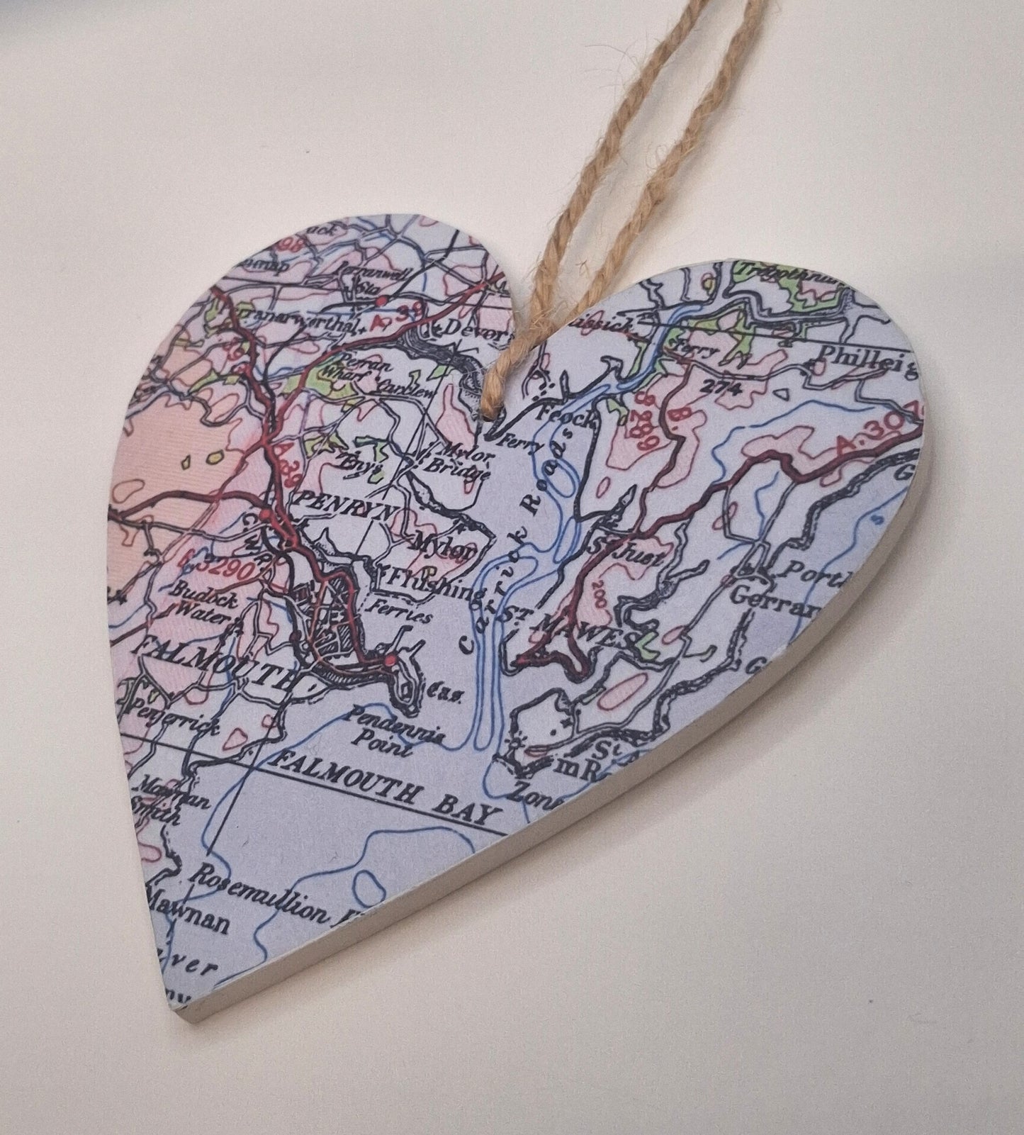 Vintage map heart in pastel colours with a natural jute string
