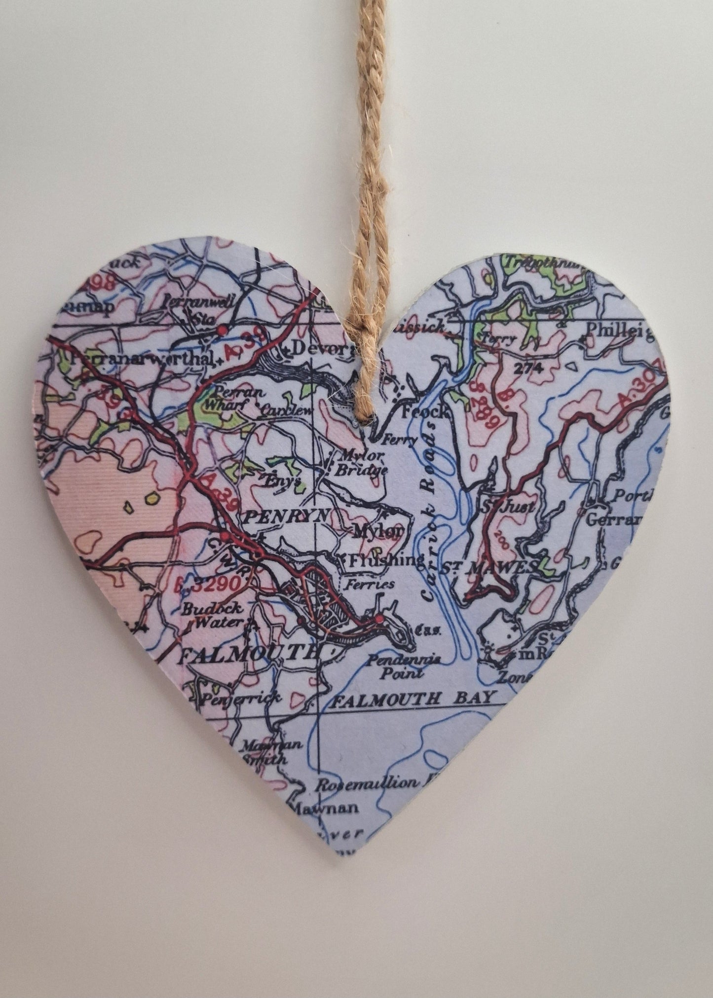 Vintage map heart in pastel colours with a natural jute string