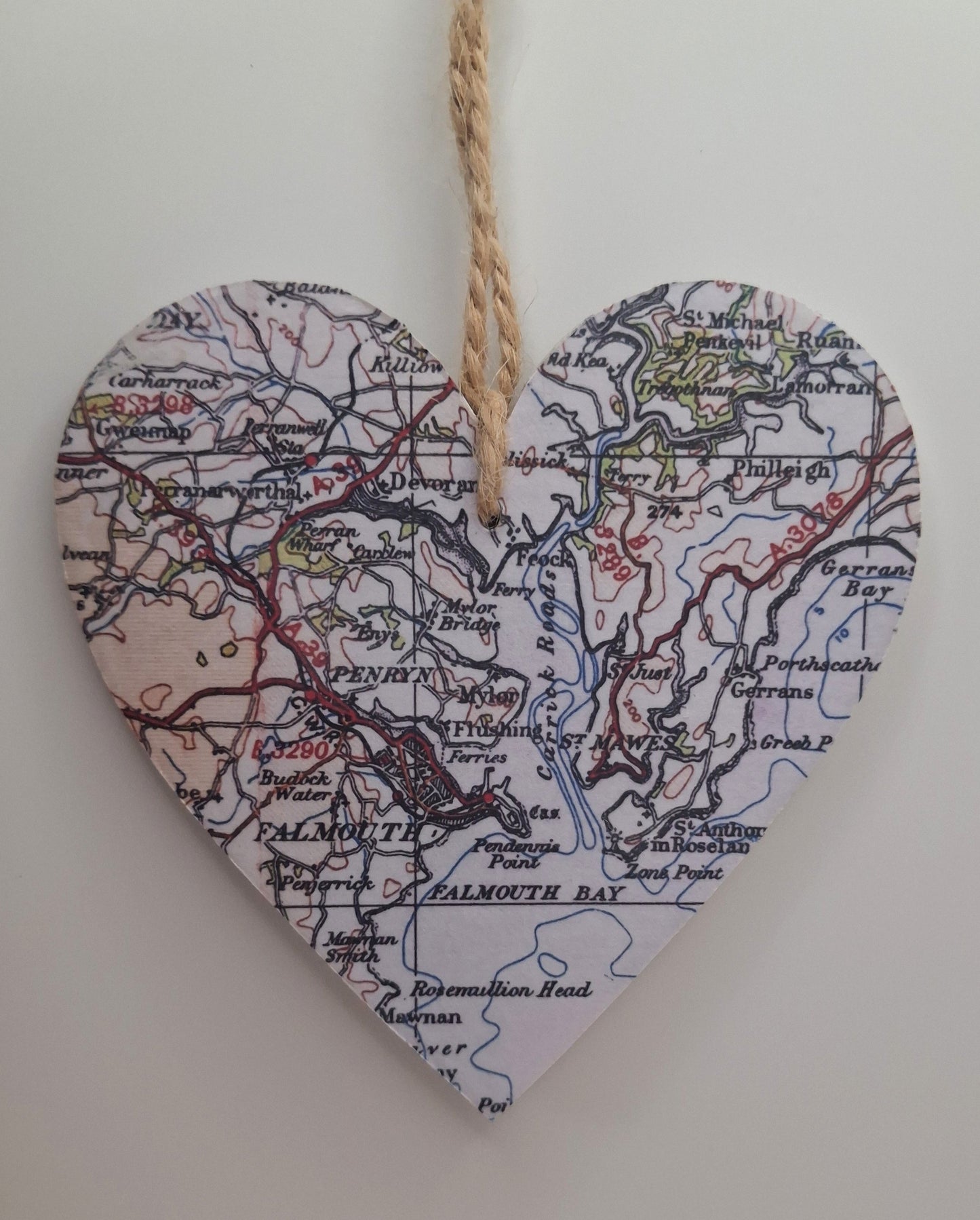 Vintage map heart in pastel colours with a natural jute string
