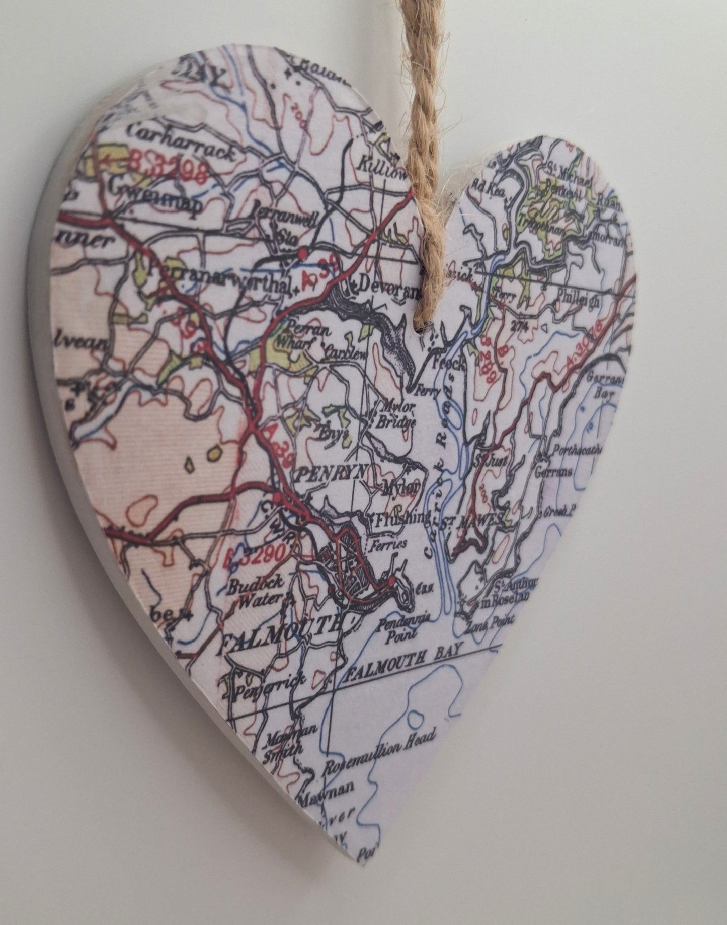 Vintage map heart in pastel colours with a natural jute string