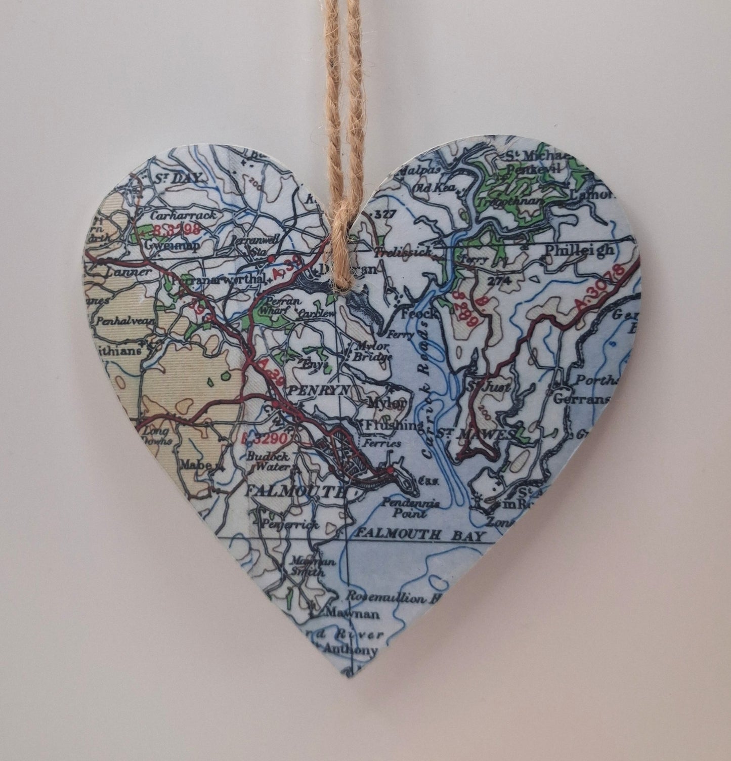 Vintage map heart in pastel colours with a natural jute string
